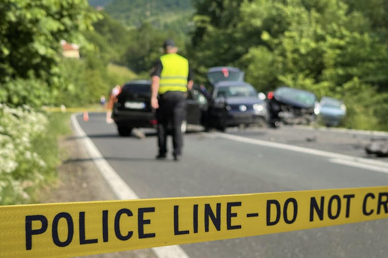 Police yellow line on traffic accident