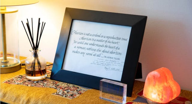 WASHINGTON, D.C. – JULY 1: A framed and signed note from legendary abortion provider and advocate Dr. George Tiller in the office of Melissa Grant at the headquarters of Carafem in Washington, D.C., on July 1, 2022. (Amanda Andrade-Rhoades/For The Washington Post via Getty Images) WASHINGTON, D.C. – JULY 1: A framed and signed note from legendary abortion provider and advocate Dr. George Tiller in the office of Melissa Grant at the headquarters of Carafem in Washington, D.C., on July 1, 2022. (Amanda Andrade-Rhoades/For The Washington Post via Getty Images)