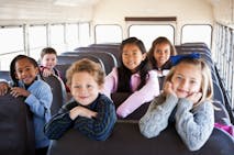 Children sitting inside school bus
