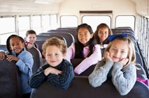 Children sitting inside school bus