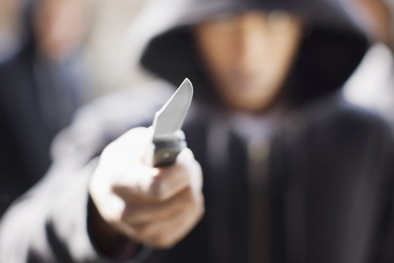 Man threatening with pocket knife