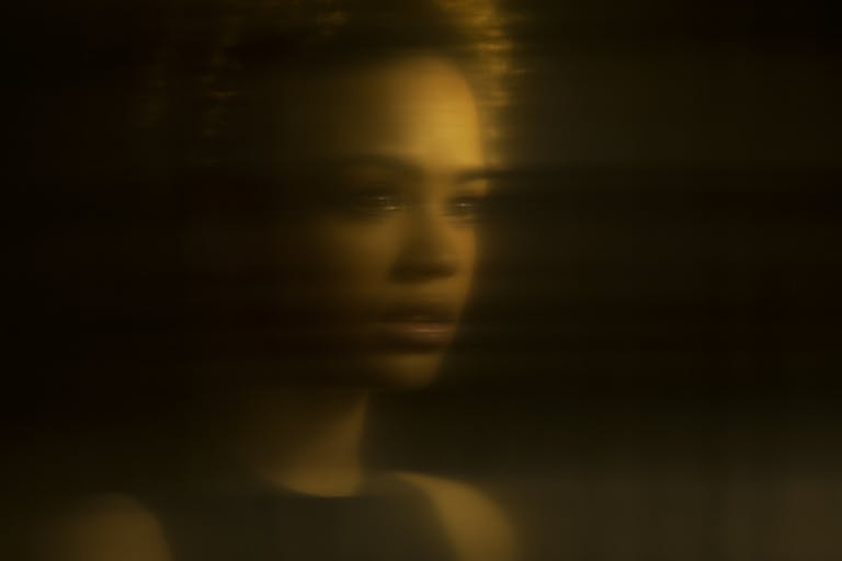 Distorted portrait of female, reflection