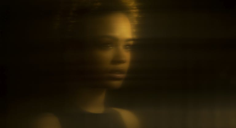 Distorted portrait of female, reflection