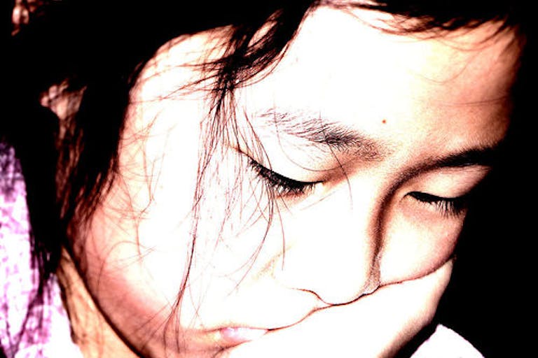 sad girl, trafficking, slavery, China