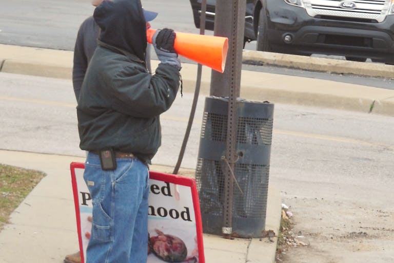 yelling prolifer shout pro life