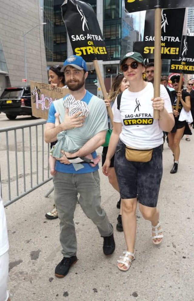 NEW YORK, NEW YORK – JULY 21: Daniel Radcliffe and Erin Darke join the picket line In New York City on July 21, 2023 in New York City. Members of SAG-AFTRA, Hollywood’s largest union which represents actors and other media professionals, have joined striking WGA (Writers Guild of America) workers… (Photo by John Nacion/Getty Images) NEW YORK, NEW YORK – JULY 21: Daniel Radcliffe and Erin Darke join the picket line In New York City on July 21, 2023 in New York City. Members of SAG-AFTRA, Hollywood’s largest union which represents actors and other media professionals, have joined striking WGA (Writers Guild of America) workers… (Photo by John Nacion/Getty Images)