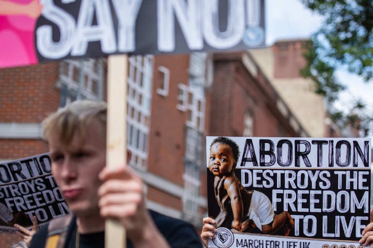 An activist holds a placard during the March For Life