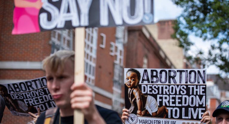 An activist holds a placard during the March For Life