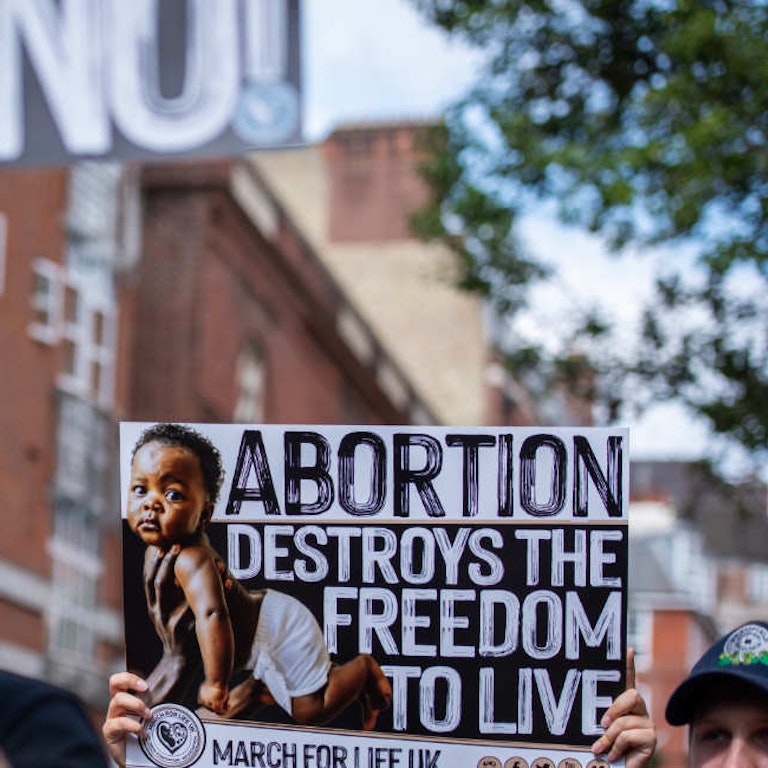 An activist holds a placard during the March For Life