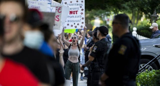 CHEVY CHASE, MARYLAND – JUNE 29: Abortion rights activists with Our Rights DC march in front of Supreme Court Justice Brett Kavanaugh’s house on June 29, 2022 in Chevy Chase, Maryland. Over the last couple months, abortion rights activists have staged protests against the five conservative U.S. Supreme Court Justices. The Supreme Court’s recent decision in the Dobbs v Jackson Women’s Health case overturned the 50-year-old Roe v Wade case and erased federal protection to abortion. (Photo by Anna Moneymaker/Getty Images) CHEVY CHASE, MARYLAND – JUNE 29: Abortion rights activists with Our Rights DC march in front of Supreme Court Justice Brett Kavanaugh’s house on June 29, 2022 in Chevy Chase, Maryland. Over the last couple months, abortion rights activists have staged protests against the five conservative U.S. Supreme Court Justices. The Supreme Court’s recent decision in the Dobbs v Jackson Women’s Health case overturned the 50-year-old Roe v Wade case and erased federal protection to abortion. (Photo by Anna Moneymaker/Getty Images)