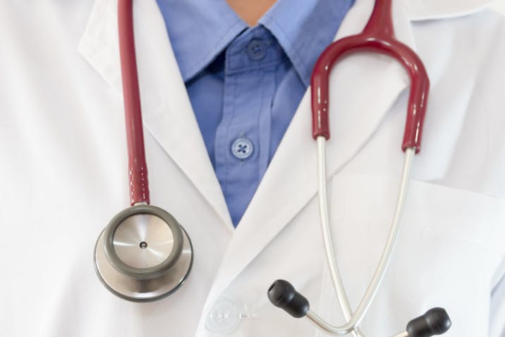 Midsection Of Female Doctor With Stethoscope