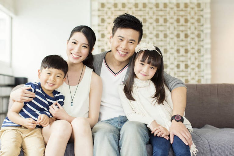 Young Chinese Family in Apartment