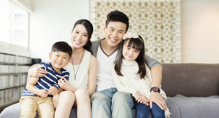 Young Chinese Family in Apartment