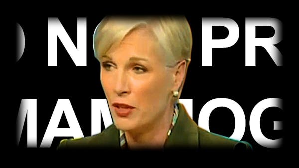 A women with short blonde hair speaking