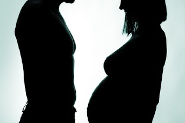 man and woman pregnant