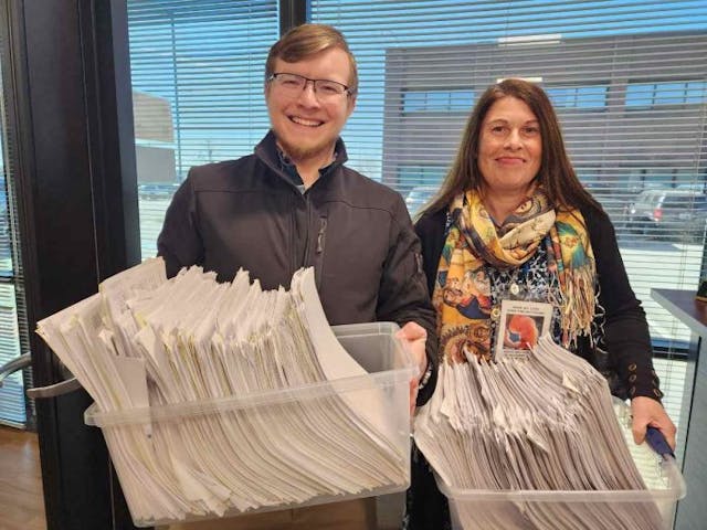 Bellevue residents Joshua Voogd and Judy Mansisidor turn in the signatures to the City Clerk on February 27, 2023. (Photo: Mark Lee Dickson)