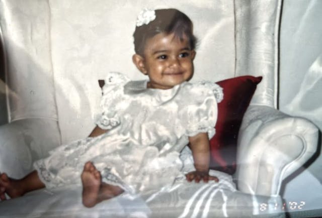 Photo of Alisha on her first birthday – via Yasha. Do not republish.