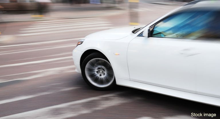 Left turning car on zebra crossing