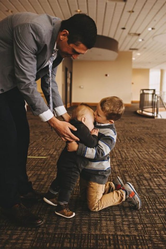 Brotherly love. Photo ©Laura Brandon (Do not reprint.) abortion survivor