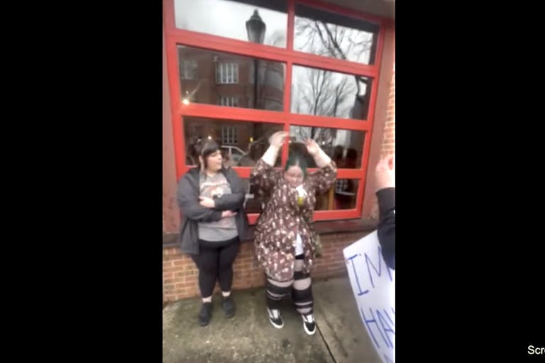 activist throws glass bottle TN SFLA