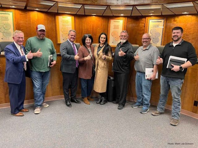 Abortion On Trial General Counsel Mike Seibel and Right To Life Committee of Lea County member Lori Bova take a picture with the leadership of the City of Eunice. (Photo: Mark Lee Dickson)