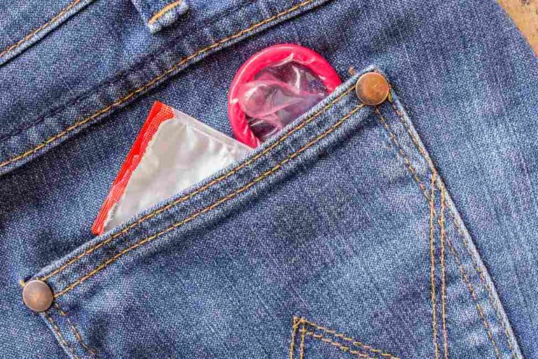Close-Up Of Condom In Pocket
