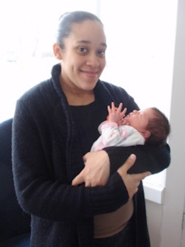 One of our moms with her newborn One of our moms with her newborn