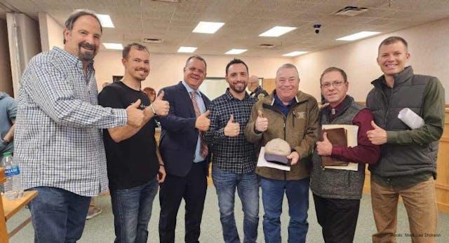 Attorney Mike Seibel (center) takes a celebratory picture with Clovis residents after the historic vote. (Photo: Mark Lee Dickson)