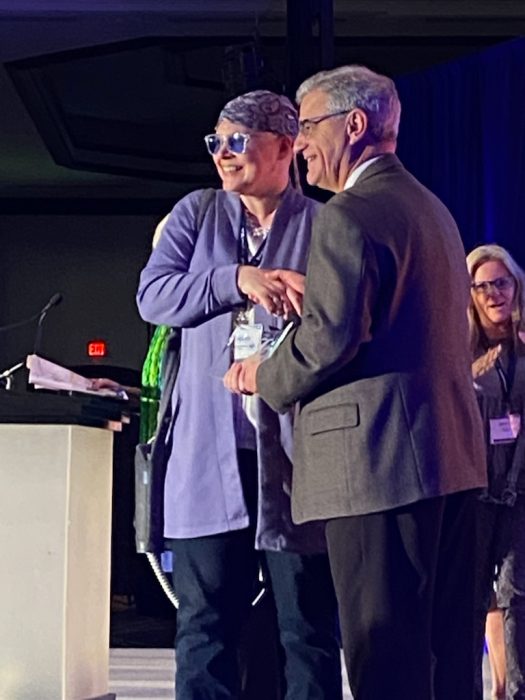 Jeanneane Maxon receives one of four Servant Leader of Year awards at the Heartbeat International Conference. Photo courtesy of Jeanneane Maxon. Do not reprint.