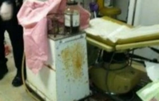 Stained equipment in an abortion clinic right next to an examination table - in one of the "more than 50" clinics that were closed down.