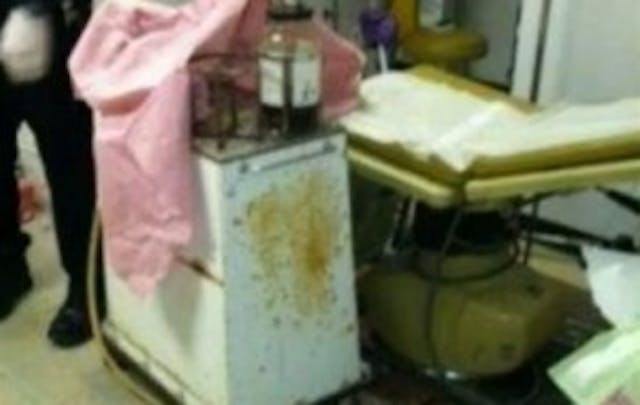 Stained equipment in an abortion clinic right next to an examination table. Stained equipment in an abortion clinic right next to an examination table - in one of the "more than 50" clinics that were closed down.