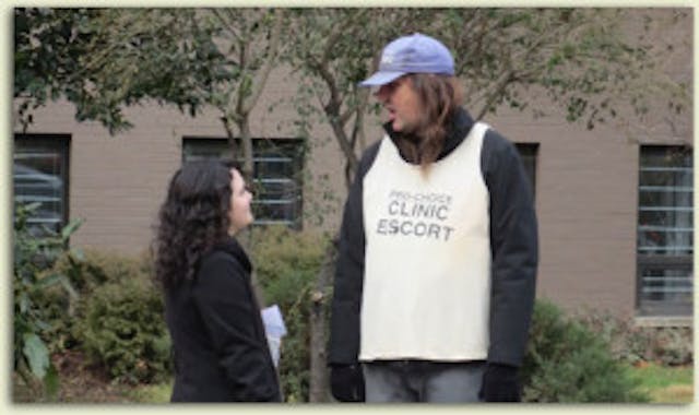 Gabriella with Phil, a Planned Parenthood Clinic escort in Washington, D.C. Phil