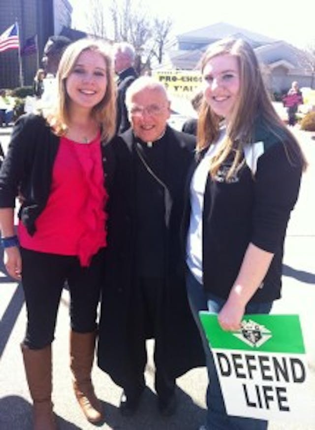 Claire with Bishop Emeritus Foley, the former Bishop of the Catholic Diocese of Birmingham, and Elena, the former president of the Pope John Paul II pro-life club in Huntsville, AL. The three of us spoke at a pro-life rally outside of the Alabama Women’s Center for Reproductive Alternatives, which is just closed but is attempting to re-open near a middle school. 1622279_10203128274745564_427966218_n