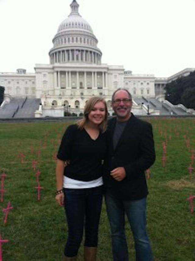 Claire with Rev Mahoney, a prominent pro-life activist, in front of the Cemetery of the Innocents display on the Capitol Lawn in Washington, D.C. 1398835_10202166397299229_1491151659_o