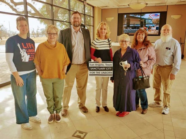 Leader of the San Angelo Initiative Ryan Buck, takes a picture with supporters ready to see San Angelo become a Sanctuary City for the Unborn. (Photo: Mark Lee Dickson)