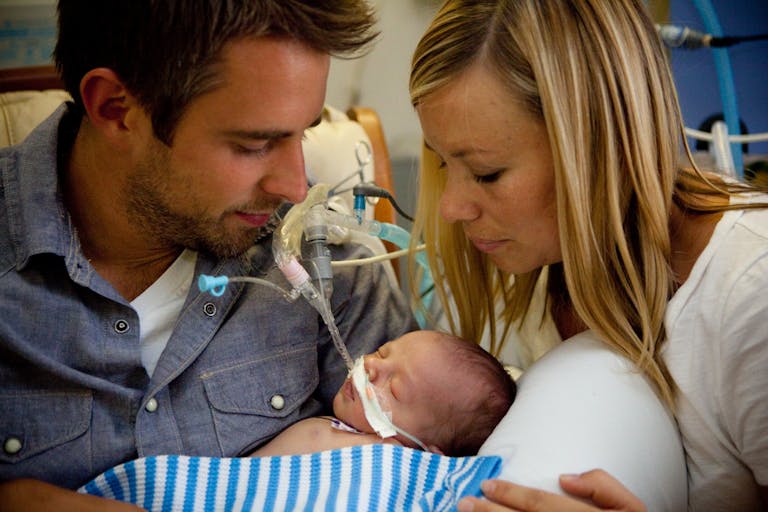 Bowen Hammit with his parents. He was diagnosed with HLHS - Hypoplastic Left Heart Syndrome. In some countries in Europe, over 70% of babies with HLHS are aborted.