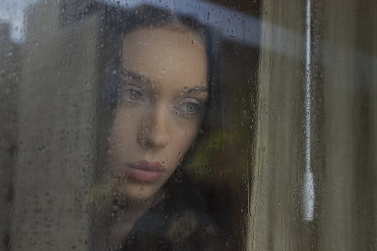 abortion pill, sad woman