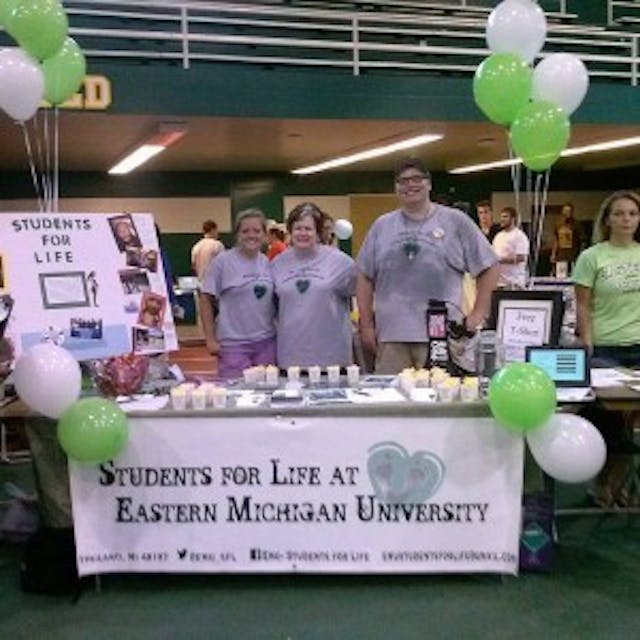 Katie with the Eastern Michigan University Students for Life table. 10647678_358075001023963_1480446129_n