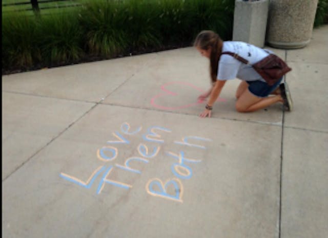 Katie chalking Eastern Michigan University’s campus. Screenshot 2014-09-21 at 10.38.00 PM
