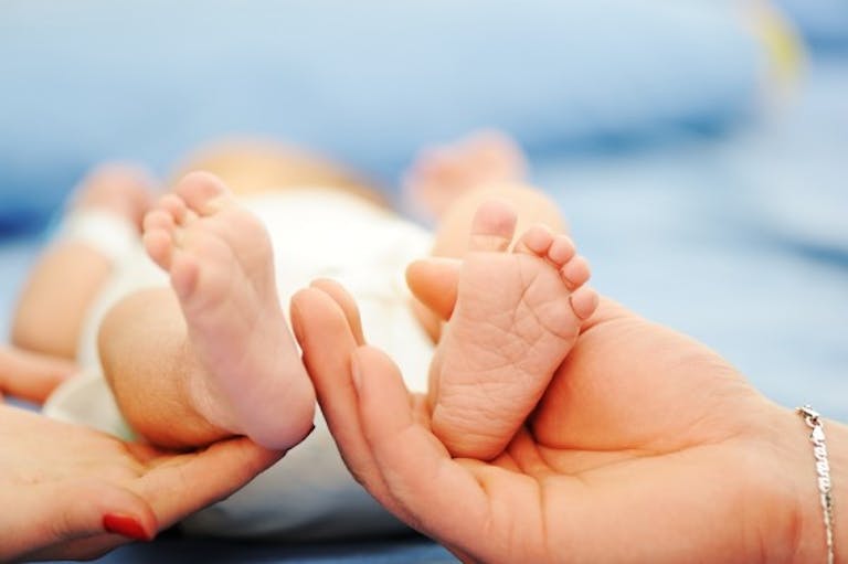 baby-feet-light-blue