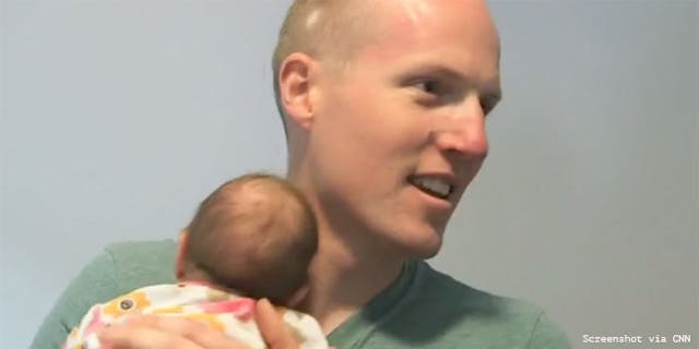 officer adopt baby heroin, holets, adoption