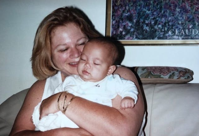 Zoe and her mom. Photo via Facebook. adoption