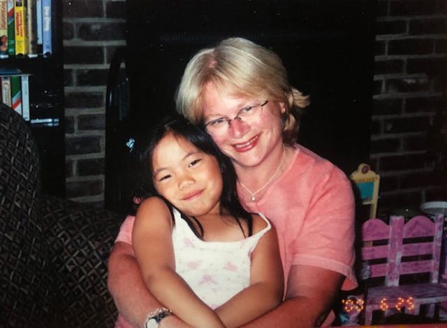 Zoe and her mother. Photo via Facebook. adoption