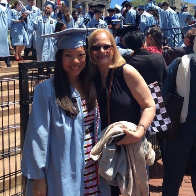 Zoe and her mom at graduation. Photo via Facebook. adoption