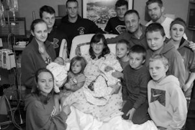 The Mahner family: Ann and Karl with Alexandria (24) – her husband Jason (26), Emily (22) and her son Carter, Agustin (20), Veronica (17), Damian (16), Elijah (14), Blaise (12), Christian (10), Angelo (8), Markus (6), Clare (4), and baby Miriam. © NILMDTS Tina Scott Photography. (Photo courtesy of the Mahner family) Baby Miriam’s story is showing the world that even short lives are worth living image