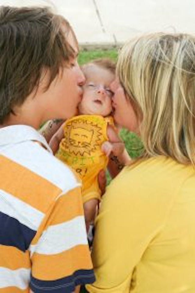 Baby Kaden with his parents. via facebook