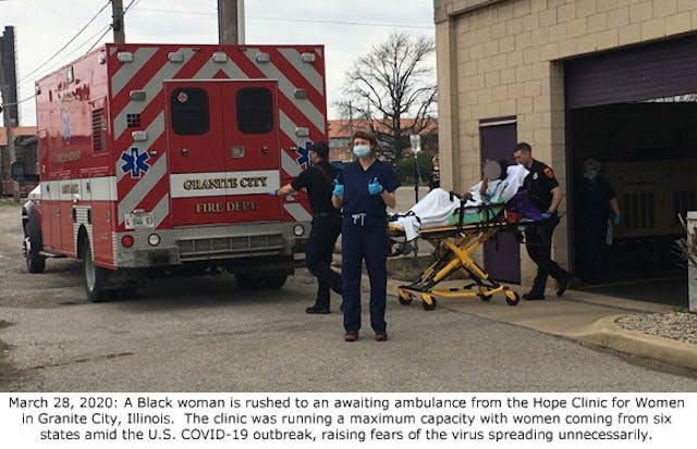 Ambulance at Hope abortion Clinic in Illinois shows staffer in PPE 3-28-2020 (Photo published at: Operation Rescue) Image: Ambulance at Hope abortion Clinic in Illinois shows staffer in PPE 3-28-2020 (Photo published at: Operation Rescue)