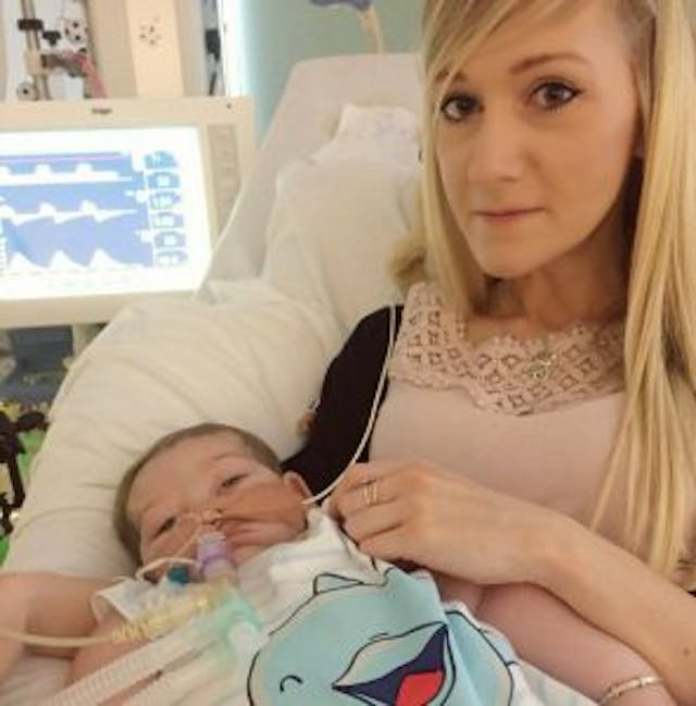 Connie Yates holds her son Charlie Gard. photo via Facebook