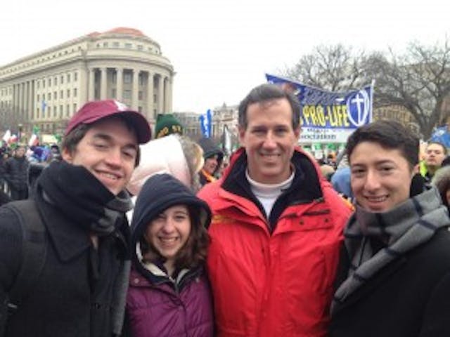 Rick Santorum at the 2013 March for Life posing with Fordham University students.