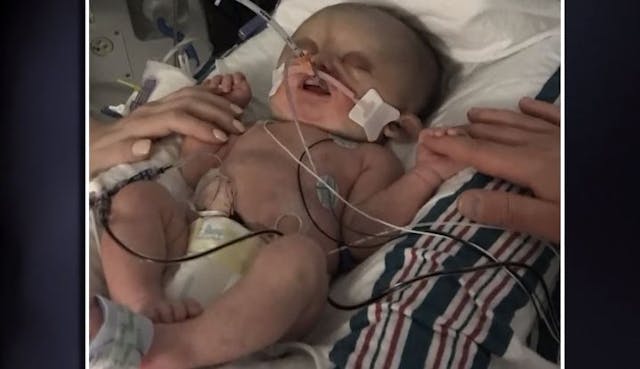 Baby Carson shortly after birth (video screenshot) screenshot